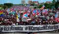 Thousands of Puerto Ricans gather for what many are expecting to be one of the biggest protests ever seen in the U.S. territory, with irate islanders pledging to drive Gov. Ricardo Rossello from office, in San Juan, Puerto Rico, Monday, July 22, 2019. Protesters are demanding Rossello step down for his involvement in a private chat in which he used profanities to describe an ex-New York City councilwoman and a federal control board overseeing the island's finance. (AP Photo/Carlos Giusti)